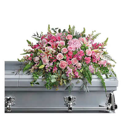 Pink floral casket spray with roses and lilies