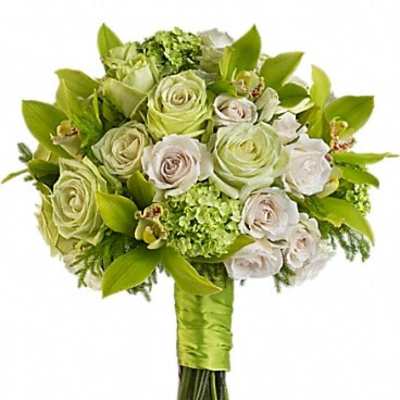 Bouquet of pale green and white roses with green accents