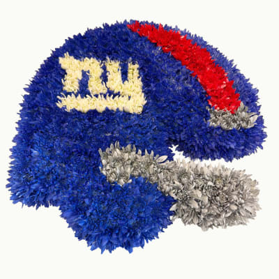 Blue chrysanthemum arrangement shaped like a football helmet with red, white, and silver accents