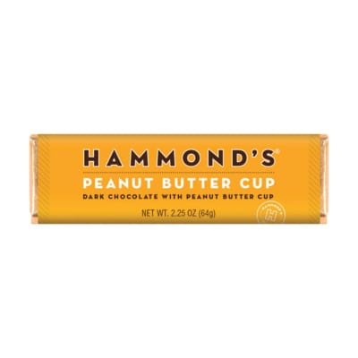 A Hammond's peanut butter cup chocolate bar in yellow packaging