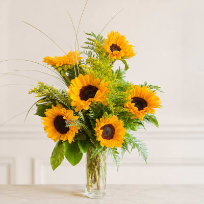 Sunflower bouquet in a clear glass vase