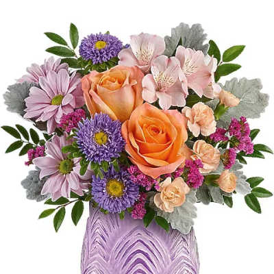 Bouquet of orange roses and purple daisies in a lavender vase