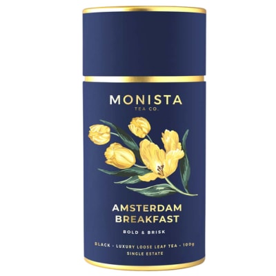 Blue tea tin with yellow floral illustration and gold trim