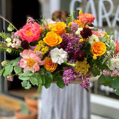 Colorful mixed bouquet with roses and assorted blooms