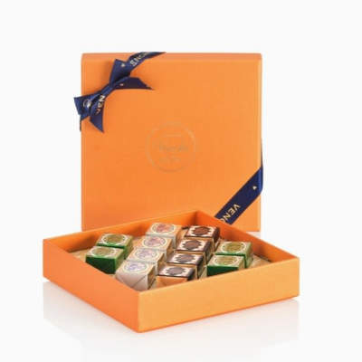 Orange gift box filled with assorted chocolates