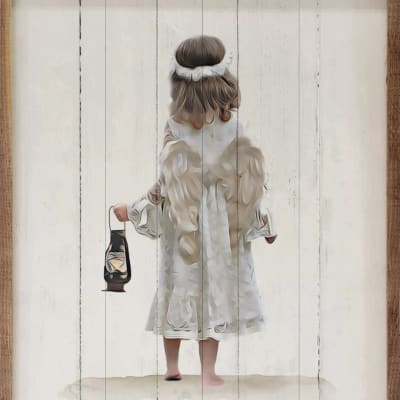 A child in a white dress holds a lantern against a painted wood backdrop.