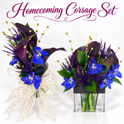 Two purple and blue corsage arrangements with gold accents and ribbon