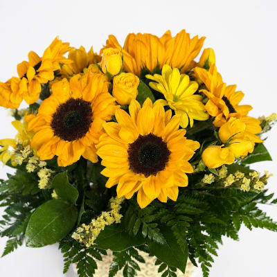 Yellow sunflower bouquet with small yellow roses and daisies