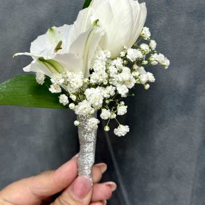 White tulips alstroemerias boutonnière