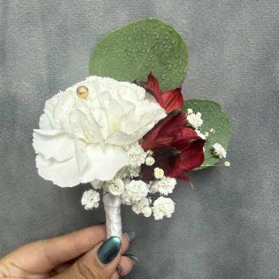 White carnation red alstroemeria boutonnière
