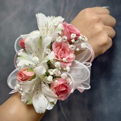 White alstroemerias pink spray roses corsage