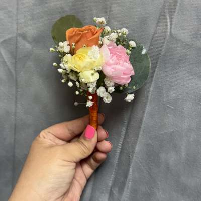 Orange yellow pink boutonnière
