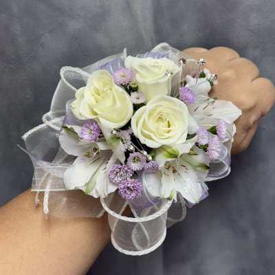 White lavender alstroemerias spray roses corsage