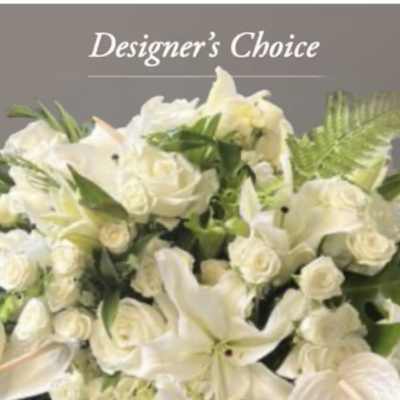 White floral arrangement with lilies and roses