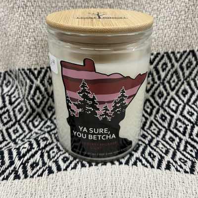 Scented candle in a glass jar with a bamboo lid
