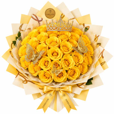 Yellow rose bouquet with a crown and butterfly decorations