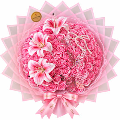 Pink rose bouquet with lilies, pearls, butterflies, and a pink ribbon