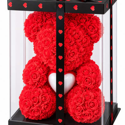 Red rose teddy bear in a clear display box with heart decorations