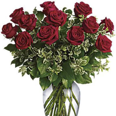 Bouquet of red roses in a clear glass vase