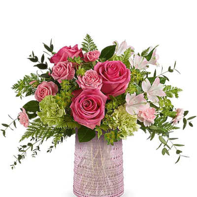 Pink roses and white lilies in a pink textured vase