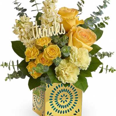 Yellow roses and cream flowers in a decorative box with a "thanks" sign