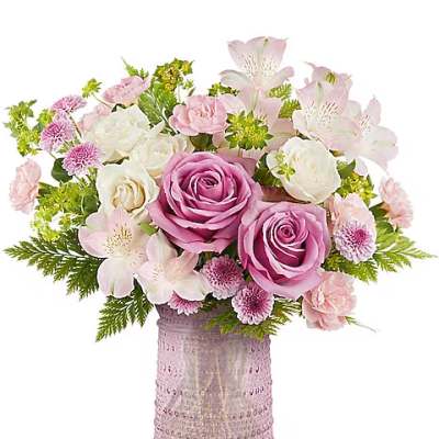 Pink and white bouquet in a textured pink vase