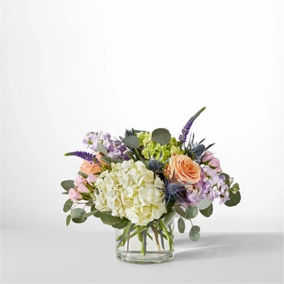 Mixed pastel bouquet in a clear glass vase