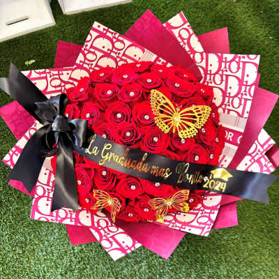 Red rose bouquet with black ribbon and graduation message
