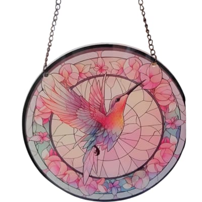 Round hanging suncatcher with a hummingbird and pink flowers
