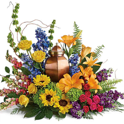 Mixed floral arrangement with a copper urn centerpiece