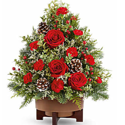 Red roses and carnations arranged in a Christmas tree shape