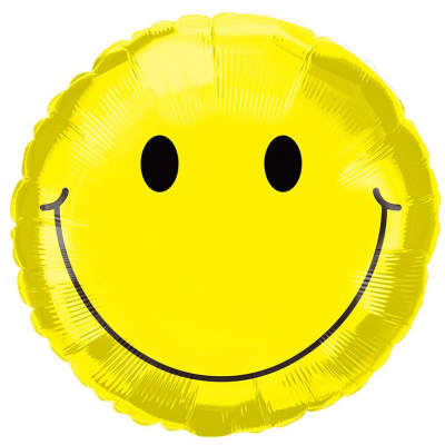 Yellow smiley-face balloon on a white background