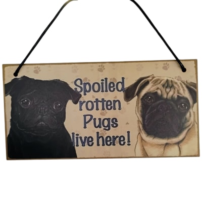 Hanging sign with two pug illustrations and text