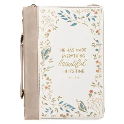 Floral-patterned zippered Bible cover with the text "He has made everything beautiful in its time"