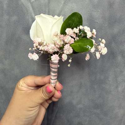 White pink boutonnière