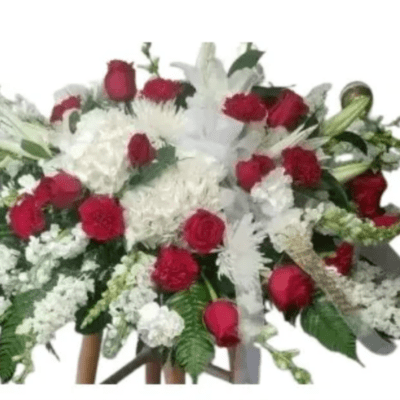 Red and white floral spray with roses and carnations