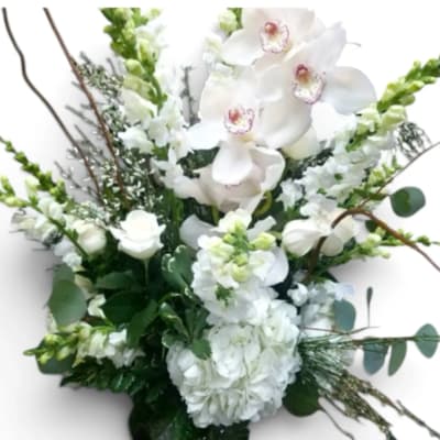 White floral bouquet with orchids and snapdragons