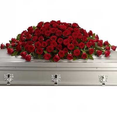 Red rose casket spray on a silver casket