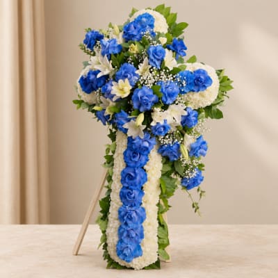 Blue and white floral standing spray on an easel