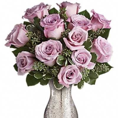 Lavender rose bouquet in a silver vase