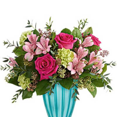 Pink roses and alstroemeria in a turquoise vase
