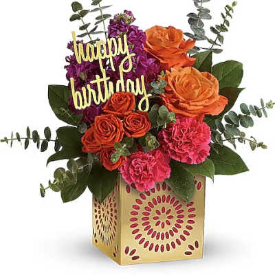 Birthday flower arrangement with roses and carnations in a decorative box