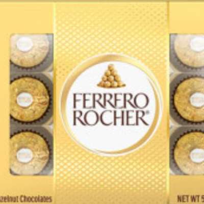 Box of Ferrero Rocher gold-wrapped chocolates in yellow packaging