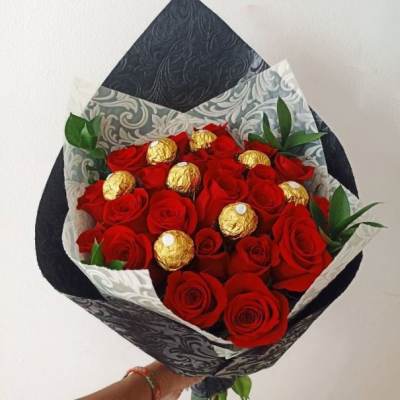 Wrapped bouquet of 24 Roses and Chocolates