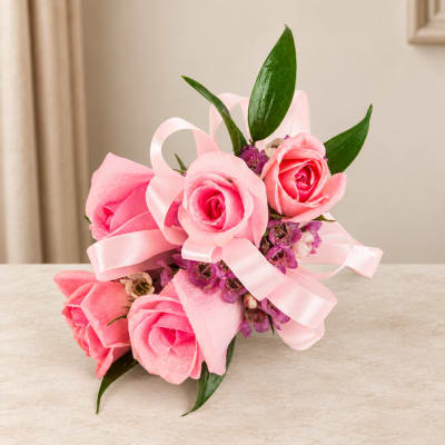 Pink rose bouquet with ribbon and purple filler flowers