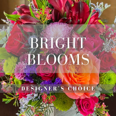 Mixed bouquet with roses, lilies, and chrysanthemums in bright colors