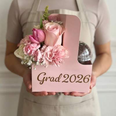 Pink floral graduation gift box with roses, tulips, and carnations