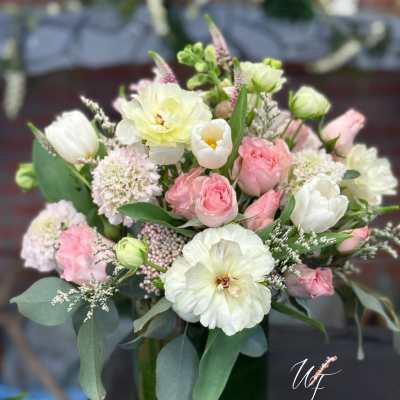 Pink and white mixed bouquet in a glass vase