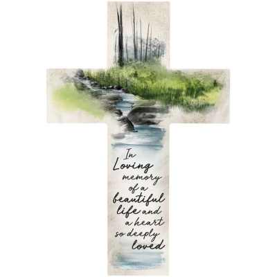 Cross-shaped memorial plaque with a stream and trees painting and condolence text