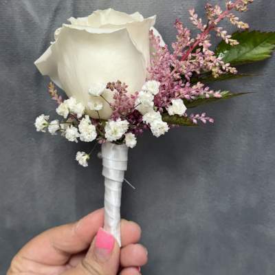 White rose pink boutonnière